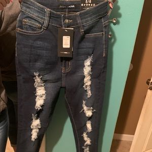 adrial distressed fashion nova jeans .